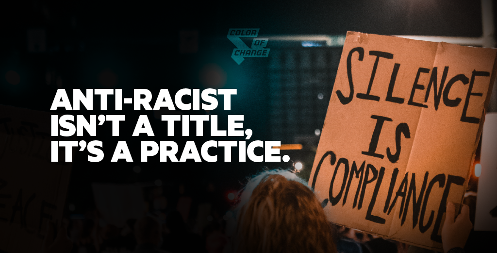 Image of white person holding silence is compliance sign