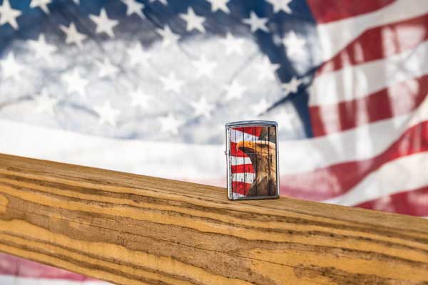 Eagle Lighter in front of American Flag background