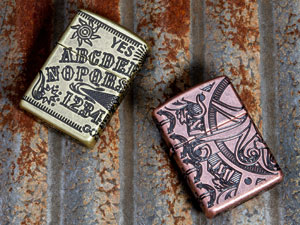 Two Armor 360 MultiCut Lighters on steel background