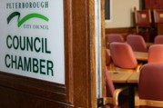 Council chamber door open.
