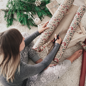 Woman Cutting Wrapping Paper